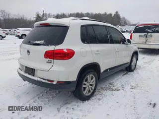 2016 Volkswagen Tiguan S with VIN WVGBV7AX2GW550558, listed as a IAAI auction lot 41553304 with 100,864 mi miles and . Bid and sale history available at DreamBid. Image 4.