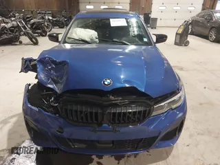 2021 BMW 3 Series M340i with VIN 3MW5U7J03M8B49500, listed as a IAAI auction lot 41018975 with 77,471 mi miles. Bid and sale history available at carsss.com. Image 12.