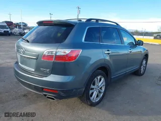 2011 Mazda CX-9 Grand Touring with VIN JM3TB3DV9B0310575, listed as a IAAI auction lot 41313813 with 146,915 mi miles. Bid and sale history available at carsss.com. Image 4.