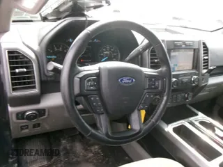 2019 Ford F-150 XL with VIN 1FTFX1E42KKC43470, listed as a IAAI auction lot 42049001 with 169,711 mi miles. Bid and sale history available at carsss.com. Image 1.