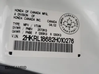 2002 Honda Odyssey EX z VIN 2HKRL18682H010276, wystawiony jako Copart lot #81397274 z przebiegiem Nie podano mil oraz Szkoda całkowita • Salvage title. Historia ofert i sprzedaży dostępna na DreamBid. Obrazek 14.