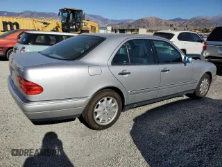1998 Mercedes-Benz E 320 with VIN WDBJF25F9WA697018, listed as a Copart auction lot 87567315 with 107,255 mi miles and Clean Title. Bid and sale history available at DreamBid. Image 3.