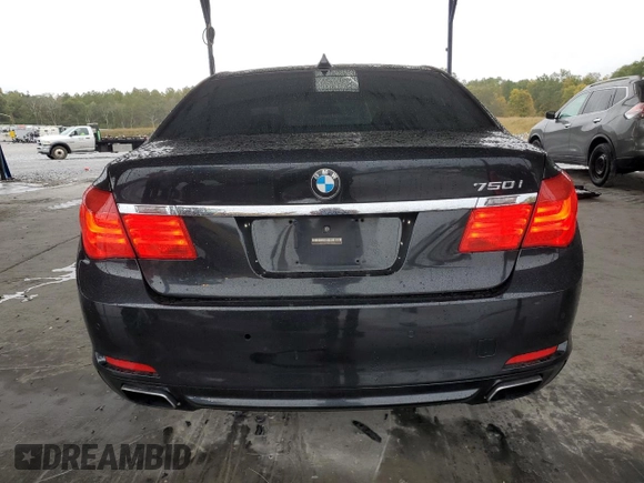 2011 BMW 7 Series 750i xDrive with VIN WBAKC6C56BC394810, listed as a Copart auction lot 79025014 with 152,399 mi miles and Salvage title. Bid and sale history available at DreamBid. Image 6.