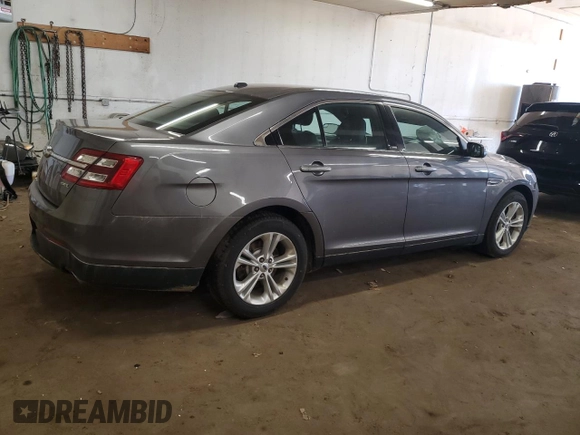 2014 Ford Taurus SEL z VIN 1FAHP2E85EG146469, wystawiony jako Copart lot #59506195 z przebiegiem 158 124 mil mil oraz Szkoda całkowita • Salvage title. Historia ofert i sprzedaży dostępna na DreamBid. Obrazek 3.