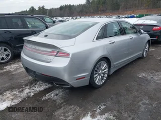 2013 Lincoln MKZ with VIN 3LN6L2J96DR800877, listed as a IAAI auction lot 41256557 with 125,584 mi miles. Bid and sale history available at carsss.com. Image 4.