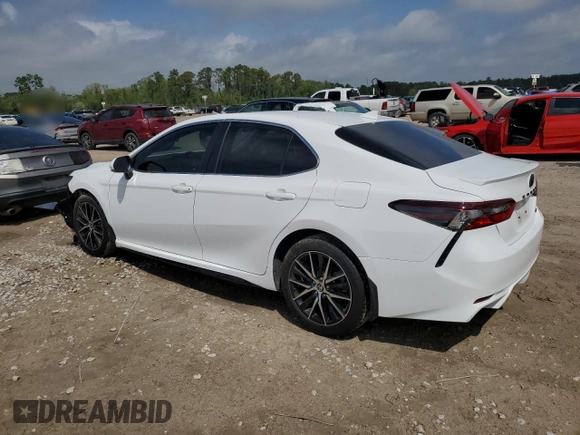 2023 Toyota Camry SE with VIN 4T1G11AKXPU767953, listed as a Copart auction lot 50728415 with 63,249 mi miles and Salvage Title. Bid and sale history available at DreamBid. Image 2.