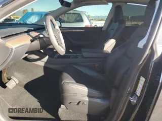 2024 Tesla Model Y with VIN 7SAYGDED7RF108604, listed as a Copart auction lot 48384825 with 24,603 mi miles and Salvage Title. Bid and sale history available at DreamBid. Image 7.