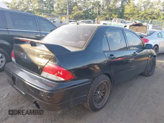 2003 Mitsubishi Lancer ES with VIN JA3AJ26EX3U015276, listed as a IAAI auction lot 37806582 with 181,069 mi miles. Bid and sale history available at carsss.com. Image 4.