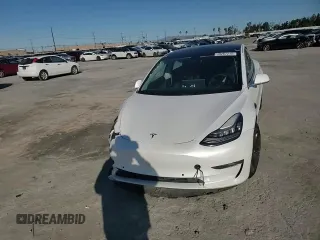 2020 Tesla Model 3 Long Range z VIN 5YJ3E1EB4LF650258, wystawiony jako Copart lot #49267215 z przebiegiem 128 825 mil mil oraz Szkoda całkowita • Salvage title. Historia ofert i sprzedaży dostępna na DreamBid. Obrazek 11.