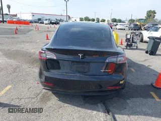 2022 Tesla Model 3 Long Range with VIN 5YJ3E1EB6NF233131, listed as a IAAI auction lot 41819409 with 38,308 mi miles and . Bid and sale history available at DreamBid. Image 15.