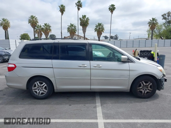 2005 Honda Odyssey EX-L with VIN 5FNRL38745B075486, listed as a IAAI auction lot 42080772 with 197,158 mi miles and . Bid and sale history available at DreamBid. Image 13.