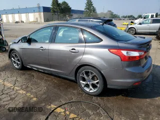 2013 Ford Focus SE with VIN 1FADP3F28DL333256, listed as a Copart auction lot 60438255 with 102,226 mi miles and Clean title. Bid and sale history available at DreamBid. Image 2.