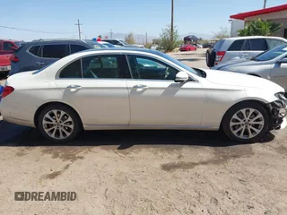 2019 Mercedes-Benz E-Class E 300 with VIN WDDZF4JBXKA597397, listed as a IAAI auction lot 41724672 with 99,258 mi miles. Bid and sale history available at carsss.com. Image 13.