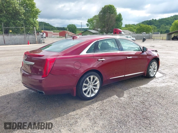 2016 Cadillac XTS Luxury Collection with VIN 2G61M5S31G9133513, listed as a IAAI auction lot 42289442 with 68,613 mi miles and . Bid and sale history available at DreamBid. Image 4.