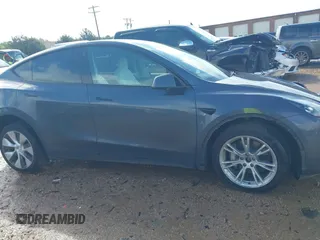 2023 Tesla Model Y Long Range with VIN 7SAYGDEE2PF674286, listed as a IAAI auction lot 42010275 with Not Provided miles and . Bid and sale history available at carsss.com. Image 13.