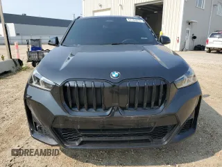 2023 BMW X1 xDrive28i with VIN WBX73EF02P5W55996, listed as a Copart auction lot 61164215 with 23,644 mi miles and Clean title. Bid and sale history available at DreamBid. Image 5.