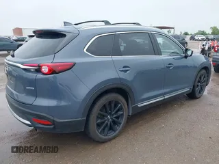 2021 Mazda CX-9 Grand Touring with VIN JM3TCBDY9M0534966, listed as a IAAI auction lot 42166071 with 77,817 mi miles and . Bid and sale history available at DreamBid. Image 4.