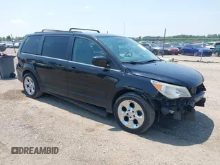 2011 Volkswagen Routan SE with VIN 2V4RW3DG2BR626226, listed as a IAAI auction lot 42672387 with 211,801 mi miles and . Bid and sale history available at DreamBid. Image 1.