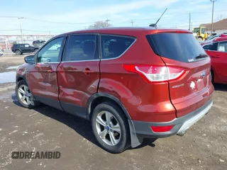 2014 Ford Escape SE with VIN 1FMCU9GX3EUA81161, listed as a IAAI auction lot 41968609 with 112,931 mi miles and . Bid and sale history available at DreamBid. Image 3.