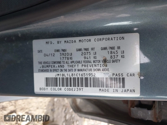 2012 Mazda Mazda3 i Touring with VIN JM1BL1L81C1651952, listed as a IAAI auction lot 40863599 with 242,296 mi miles. Bid and sale history available at carsss.com. Image 9.