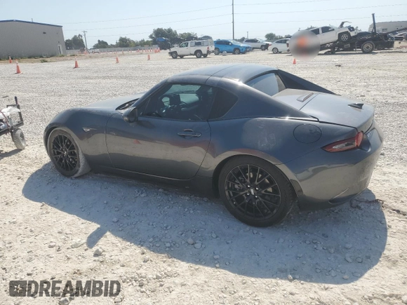 2023 Mazda MX-5 Miata Grand Touring z VIN JM1NDAM70P0550719, wystawiony jako Copart lot #75485484 z przebiegiem 21 110 mil mil oraz Szkoda całkowita • Salvage title. Historia ofert i sprzedaży dostępna na DreamBid. Obrazek 2.