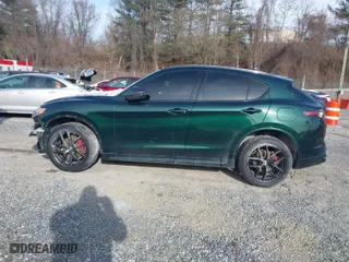 2021 Alfa Romeo Stelvio Ti with VIN ZASPAKBN4M7D02587, listed as a IAAI auction lot 41379209 with 52,427 mi miles. Bid and sale history available at carsss.com. Image 13.