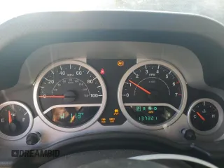 2010 Jeep Wrangler Rubicon with VIN 1J4BA6D10AL109001, listed as a Copart auction lot 69453954 with 137,821 mi miles and Salvage title. Bid and sale history available at DreamBid. Image 9.