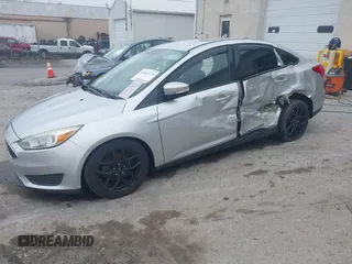 2015 Ford Focus SE with VIN 1FADP3F29FL258781, listed as a IAAI auction lot 41963223 with 121,286 mi miles and . Bid and sale history available at DreamBid. Image 2.