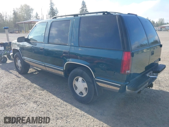 1998 Chevrolet Tahoe z VIN 1GNEK13R9WJ365044, wystawiony jako IAAI lot #42042506 z przebiegiem 187 987 mil mil oraz . Historia ofert i sprzedaży dostępna na DreamBid. Obrazek 3.