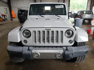 2017 Jeep Wrangler Unlimited Sahara z VIN 1C4BJWEG4HL701813, wystawiony jako Copart lot #60147255 z przebiegiem 49 924 mil mil oraz Szkoda całkowita • Salvage title. Historia ofert i sprzedaży dostępna na DreamBid. Obrazek 5.