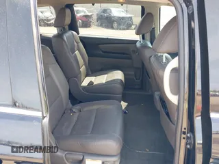 2014 Honda Odyssey Touring with VIN 5FNRL5H94EB079518, listed as a IAAI auction lot 42095098 with 141,019 mi miles and . Bid and sale history available at DreamBid. Image 8.