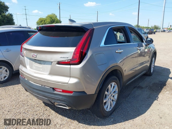 2023 Cadillac XT4 FWD Luxury with VIN 1GYAZAR4XPF116698, listed as a IAAI auction lot 40594015 with 18,368 mi miles. Bid and sale history available at carsss.com. Image 4.