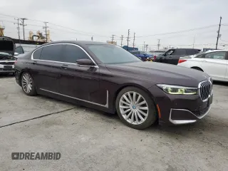 2020 BMW 7 Series 740i with VIN WBA7T2C04LCD14332, listed as a Copart auction lot 48348235 with 68,401 mi miles and Salvage title. Bid and sale history available at DreamBid. Image 4.