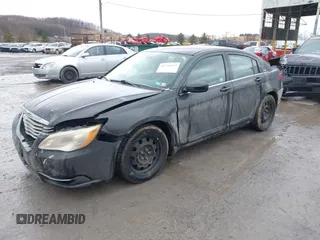 2013 Chrysler 200 LX with VIN 1C3CCBAB1DN646919, listed as a IAAI auction lot 41743113 with 167,515 mi miles and . Bid and sale history available at DreamBid. Image 2.