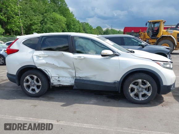 2018 Honda CR-V EX-L z VIN 2HKRW2H86JH682270, wystawiony jako IAAI lot #42182149 z przebiegiem 72 680 mil mil oraz . Historia ofert i sprzedaży dostępna na DreamBid. Obrazek 13.
