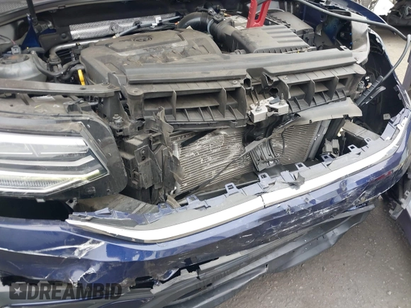 2022 Volkswagen Tiguan SE with VIN 3VV3B7AX0NM018659, listed as a IAAI auction lot 42076655 with 32,326 mi miles and . Bid and sale history available at DreamBid. Image 6.