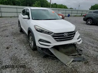 2016 Hyundai Tucson SE z VIN KM8J33A47GU167064, wystawiony jako Copart lot #56566545 z przebiegiem 101 703 mil mil oraz Szkoda całkowita • Salvage title. Historia ofert i sprzedaży dostępna na DreamBid. Obrazek 13.