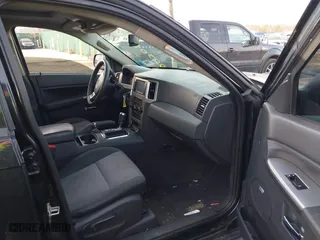 2009 Jeep Grand Cherokee Laredo with VIN 1J8GR48K29C552248, listed as a IAAI auction lot 41209184 with 194,778 mi miles. Bid and sale history available at carsss.com. Image 5.