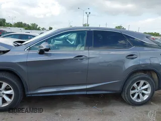 2016 Lexus RX 350 z VIN 2T2ZZMCA4GC032034, wystawiony jako IAAI lot #42095974 z przebiegiem 57 195 mil mil oraz . Historia ofert i sprzedaży dostępna na DreamBid. Obrazek 14.