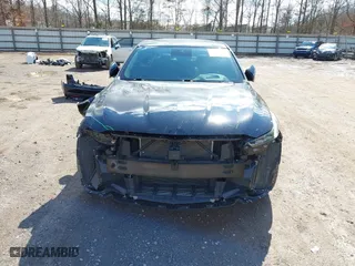2024 Cadillac CT5-V with VIN 1G6DV5RWXR0105314, listed as a IAAI auction lot 41727296 with 12,790 mi miles. Bid and sale history available at carsss.com. Image 6.