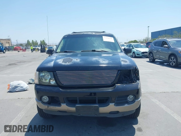 2002 Ford Explorer Eddie Bauer z VIN 1FMDU74E42ZC47584, wystawiony jako IAAI lot #42456721 z przebiegiem 141 518 mil mil oraz . Historia ofert i sprzedaży dostępna na DreamBid. Obrazek 12.