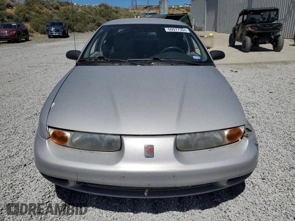 2001 Saturn SL with VIN 1G8ZK52731Z237050, listed as a Copart auction lot 60977394 with Not provided miles and Salvage title. Bid and sale history available at DreamBid. Image 5.