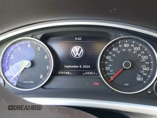 2013 Volkswagen Touareg Lux with VIN WVGEF9BP6DD004454, listed as a IAAI auction lot 41862958 with 239,548 mi miles and . Bid and sale history available at DreamBid. Image 7.