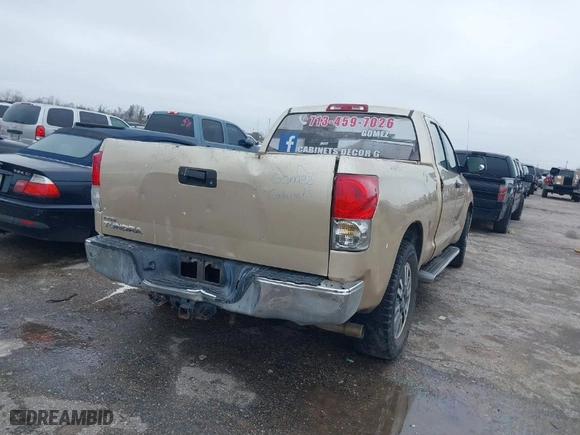 2010 Toyota Tundra 2WD Truck with VIN 5TFRM5F14AX012699, listed as a IAAI auction lot 41436869 with 1 mi miles. Bid and sale history available at carsss.com. Image 4.