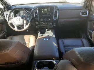 2021 Nissan Titan XD SV with VIN 1N6AA1FB0MN517885, listed as a Copart auction lot 77046004 with 52,284 mi miles and Salvage Title. Bid and sale history available at carsss.com. Image 8.
