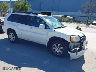 2011 Mitsubishi Endeavor LS with VIN 4A4JN2AS4BE030702, listed as a IAAI auction lot 41871379 with 216,928 mi miles. Bid and sale history available at carsss.com. Image 1.