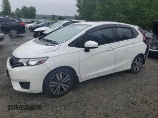 2016 Honda Fit EX-L with VIN JHMGK5H99GS012573, listed as a Copart auction lot 63051315 with 101,428 mi miles and Salvage title. Bid and sale history available at DreamBid. Image 1.