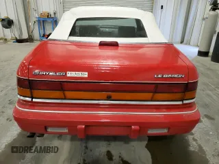 1995 Chrysler LeBaron z VIN 1C3EU4532SF539115, wystawiony jako Copart lot #85013184 z przebiegiem 109 165 mil mil oraz Szkody całkowita. Historia ofert i sprzedaży dostępna na DreamBid. Obrazek 6.
