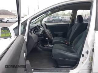 2010 Nissan Versa 1.8 SL with VIN 3N1BC1CP2AL457222, listed as a IAAI auction lot 42128211 with 194,450 mi miles. Bid and sale history available at carsss.com. Image 5.