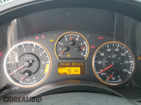 2013 Nissan Titan Pro-4X with VIN 1N6BA0ECXDN313300, listed as a Copart auction lot 46987125 with 174,432 mi miles and Salvage title. Bid and sale history available at DreamBid. Image 9.